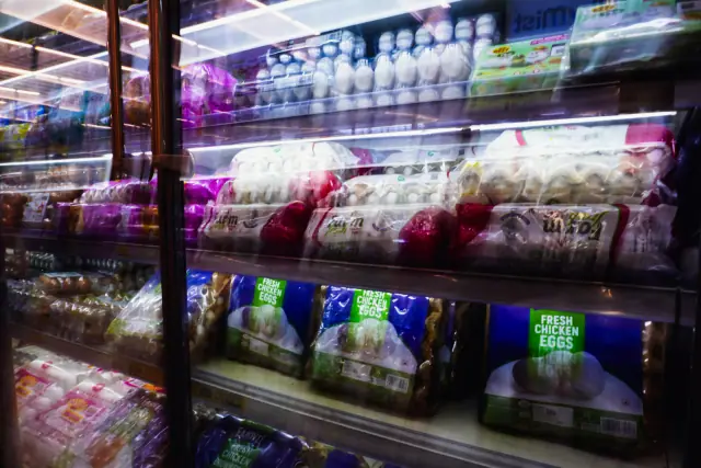 Packaged foods and eggs on a shop shelf